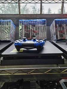 lot 21657 image: Ps4 W Remote and Assorted Games