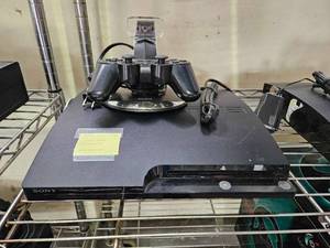 lot 21659 image: Ps3 W Remote Controller and Stand