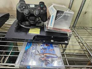 lot 21661 image: Ps3 W 2 Remote Controller, Stand and Game