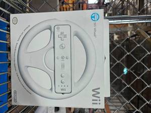 lot 21610 image: (3) Wii Wheel