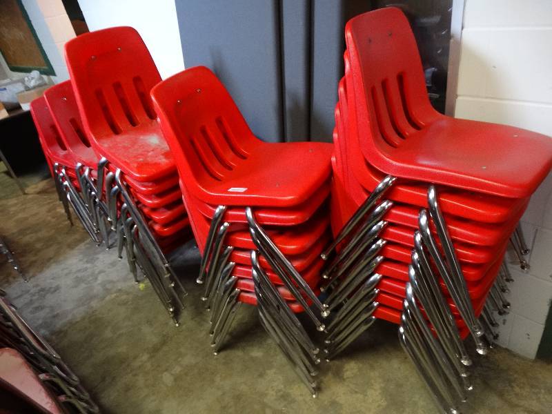 lot 583 image: Lot of 35 red stacking chairs