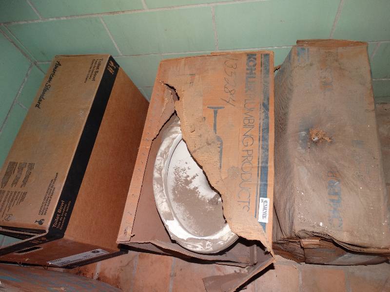 lot 605 image: 3 toilet bowls in boxes