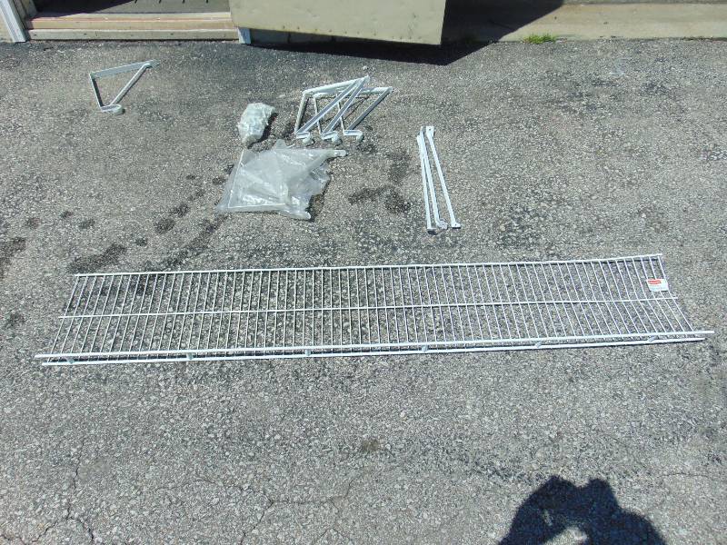 lot 2034 image: (1) 12 x 68 Rubbermaid Rod Shelf w (4) brackets, (3) shelf supports and plastic pins with screws