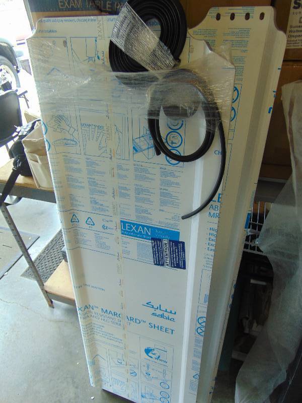 lot 2047 image: (2) Lexan Polycarbonate sheets (1) 59 x 20 Weather strip included, (1) 59 x 10
