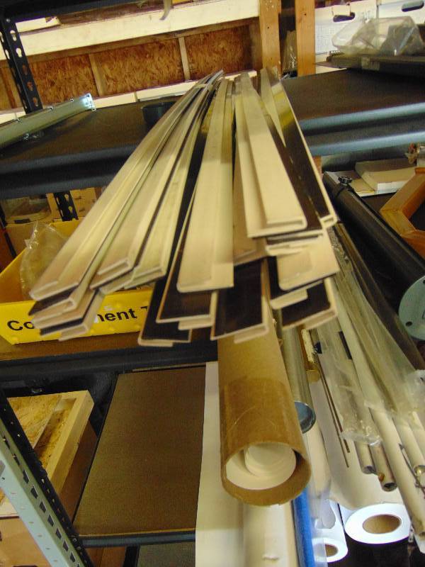 lot 2057 image: (20) piece lot magnetic J channel weatherstrip, 53 x approx 1 w 58 J channel