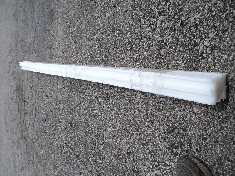 lot 2205 image: (6) ct. lot plastic door track 74 x 1-14 x 1