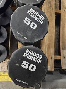 lot 9706 image: (2) 50lb Hammer Strength Dumbbells