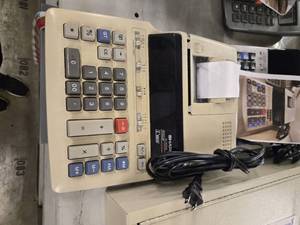 lot 20841 image: (2) Sharp Calculators