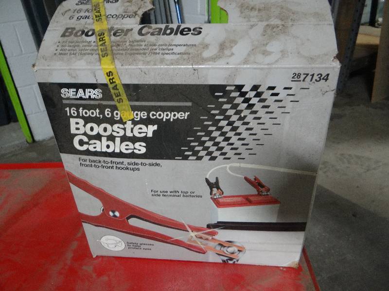 lot 590 image: 16 ft 6 gauge copper booster cables in box.