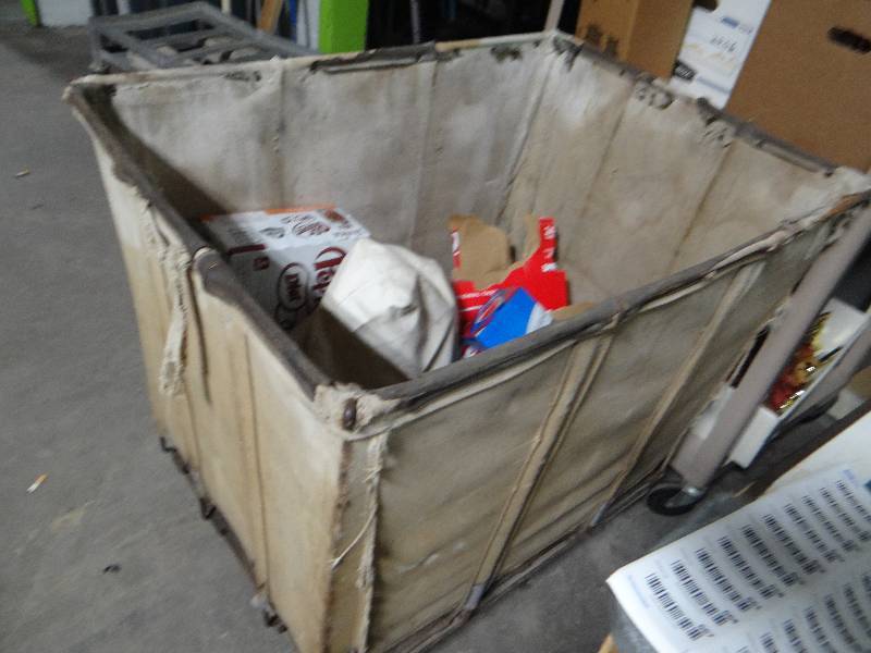 lot 616 image: Metal frame mail cart on wheels.