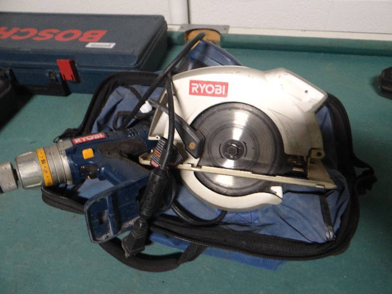 lot 629 image: Ryobi circular saw & Ryobi cordless drill w bag