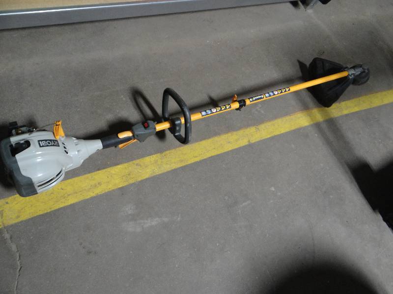 lot 643 image: Ryobi straight shaft gas weed eater