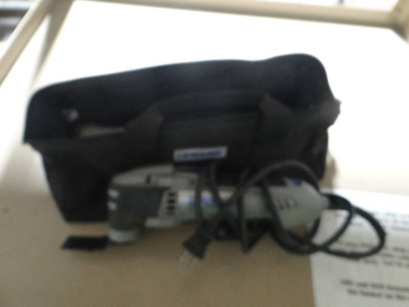 lot 669 image: Dremel multi max tool w bag