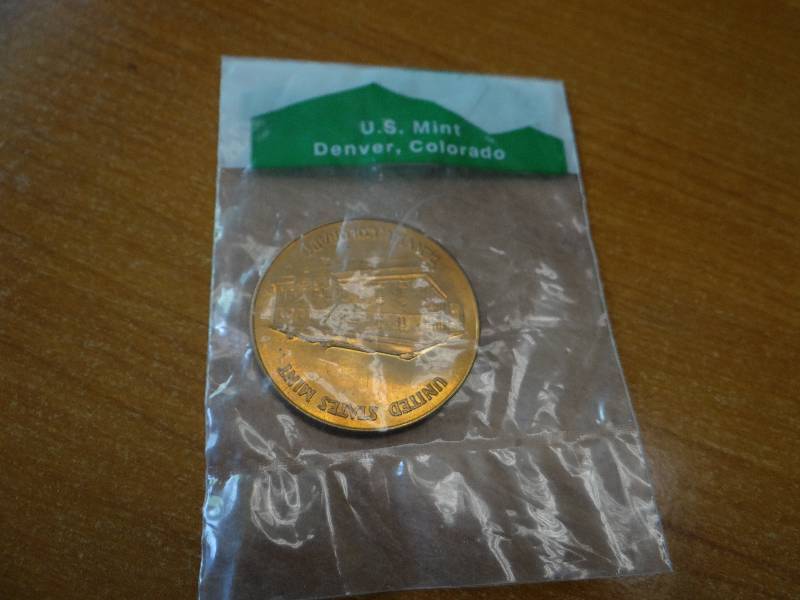 lot 404 image: U.S. Mint- Denver, Colorado coin in plastic