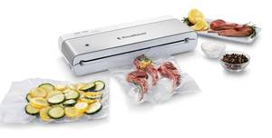 lot 2165 image: FoodSaver Compact Vacuum Sealer Machine with Airtight Bags and Roll - Ideal for Sous Vide and Airtight Food Storage, White - Retail $78.32
