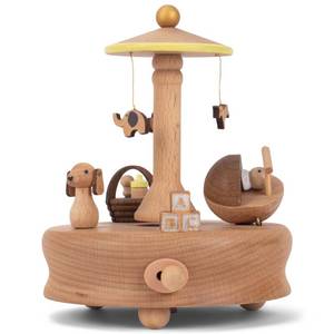 lot 3326 image: Cottage Garden Sleeping Baby Woodgrain 6 inch Beech Wind-Up Musical Figurine
