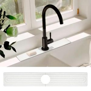 lot 8511 image: Stone Faucet Mat for Kitchen Sink, Bathroom Sink Splash Guard, Diatomite Quick Drying Stone Mat For Kitchen Sink, Water Absorbing Mat Splash Guard for Kitchen & Bathroom Sink ( 23.6 x 3.9, White)