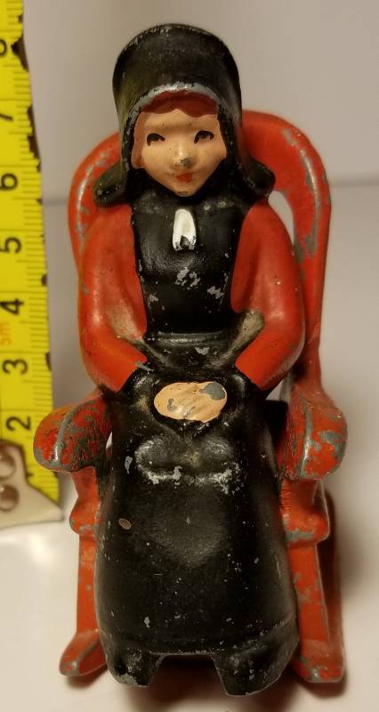 lot 11 image: Unique Vintage Cast Iron lady in rocker Salt & Pepper shakers