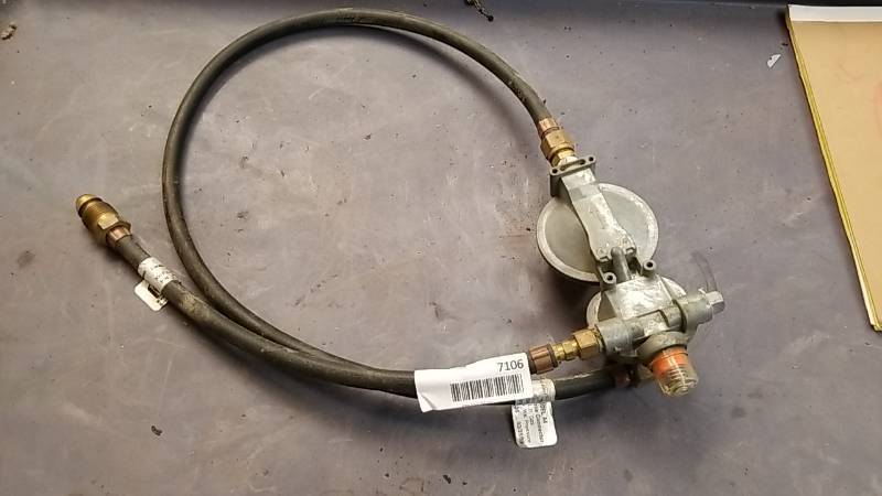 lot 7106 image: Propane Regulator Setup- Appears to be RV or Camper