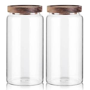 lot 10383 image: Labina Glass Storage Container Airtight Food Jars Kitchen Canister with Wood Lids, 40 Oz Wide Mouth Pantry Organization Glass Jar for Flour, Sugar, Cookie, Spagetti, Nuts and Candy (2 Pack)