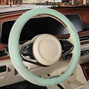 lot 10545 image: Binsheo Nappa Leather Green Steering Wheel Cover, Advanced Microfiber Leather Non-Slip Breathable Fabric, Warm in Winter and Cool in Summer, Universal 15 inch