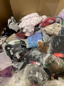 lot 77223 image: Pallet of Misc. Clothing - Approx. 4ft Tall of Clothes - Several Hundred Pieces
