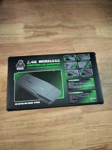 lot 2015 image: A 2.4G Wireless Controller Gamepad 4K Ultra HD Game Stick