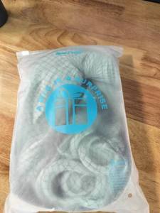 lot 2042 image: A Nice to Surprise Wig Mint Green Synthetic Hair Net