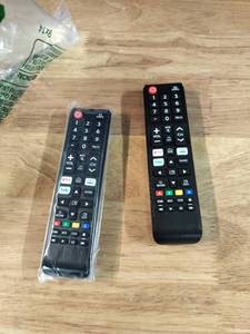 lot 2129 image: Smart TV Remote Controls with Netflix and Hulu Buttons