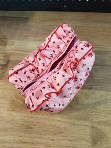 lot 2469 image: Pink Floral Print Cosmetic Makeup Bag with Ruffle Trim