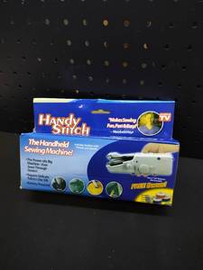 lot 4346 image: Handy Stitch Portable Handheld Sewing Machine with Bonus Thread