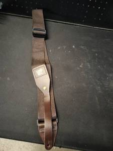 lot 6304 image: Ernie Ball Brown Leather and Nylon Guitar Strap