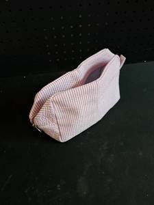 lot 12416 image: Pink and White Striped Seersucker Cosmetic Bag