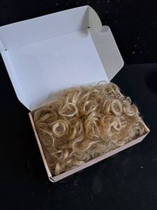 lot 12423 image: Blonde Curly Hair Extensions in Storage Box