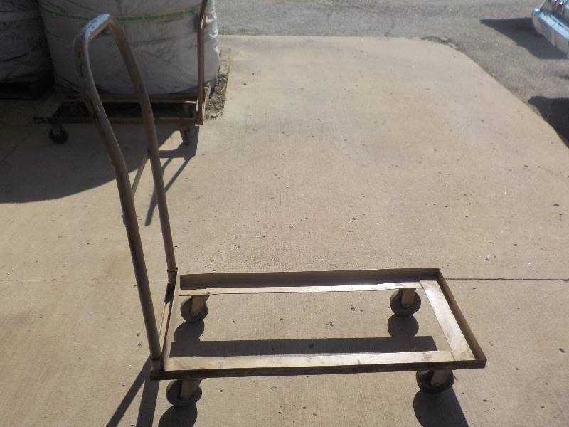 lot 4719 image: rolling metal dolly used for folding chairs