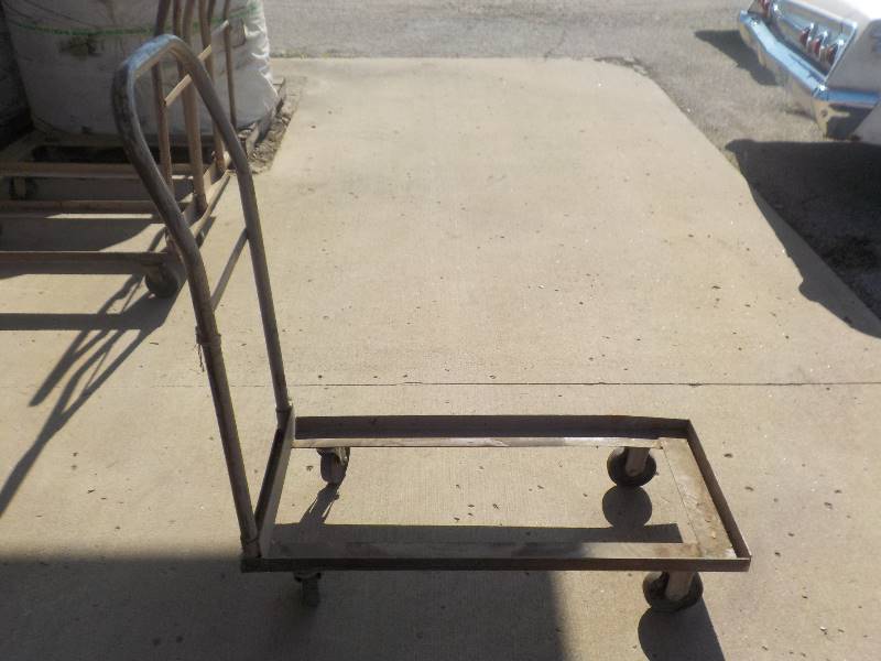 lot 4721 image: rolling metal dolly used for folding chairs