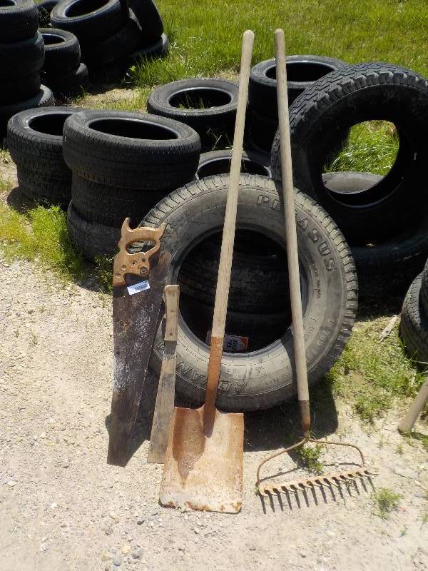 lot 4759 image: hand saw, shovel, rake and machete