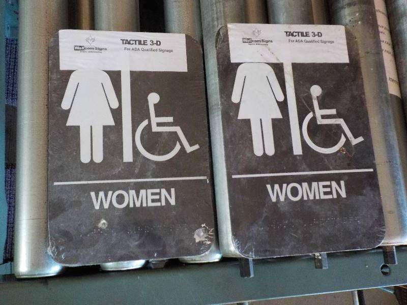 lot 4766 image: new restroom plaque