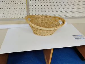 lot 1253 image: Wicker laundry basket, roll of white paper (48 inches long) and a few sheets of Plas-tex waterproof wall panel. One sheet is 24 x 48. The other sizes are pictured