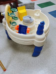 lot 1256 image: Little Tikes Spiraling Sea Water Table. Unfortunately this was found outside with sand so its now a Sand Table. Not complete