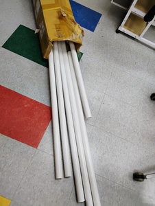 lot 1257 image: Ball rack. PVC pipe in box, box says PVC Ball Rack. Open box. Not sure if all parts are there