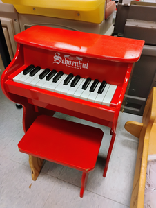 lot 923 image: Schoenhut Childrens Piano with Bench - Red with Puppy Design 20x17x10