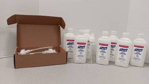 lot 1103 image: 7 Purell Hand Santiizer w Pump Nozzles