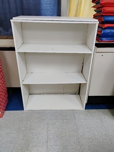 lot 1261 image: Bookshelf that is broken with extra pieces
