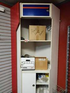 lot 19866 image: Corner Storage Cabinet with Blue Header Panel