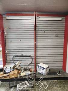 lot 19867 image: Retail Store Display Fixtures and Motorcycle Parts Lot