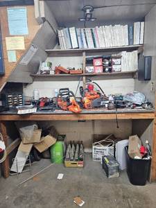 lot 21866 image: Husqvarna Chainsaw Service Shop Equipment and Parts Lot - Retail $1,200