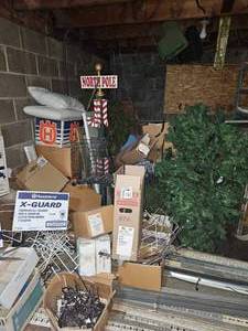 lot 21869 image: Upstairs Storage Lot - Husqvarna Equipment, Metal Shelving, and Holiday Decor - Retail $750