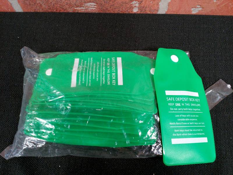 lot 185 image: Safe Deposit Key Envelopes Snap Close Green Plastic