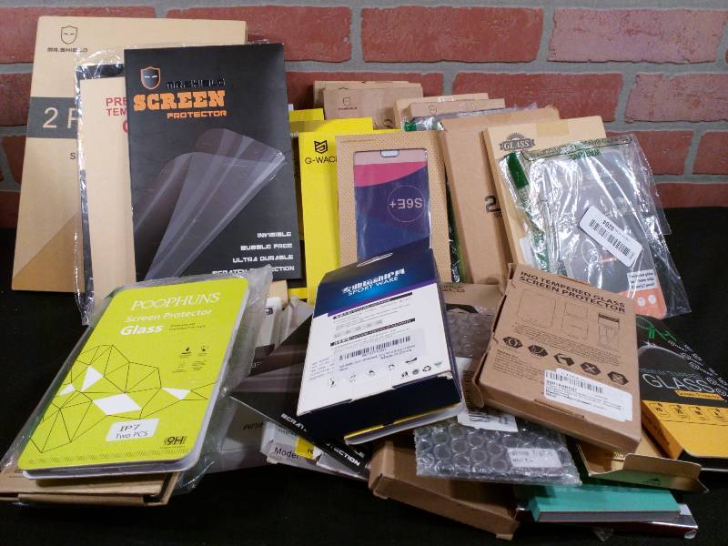 lot 242 image: Variety of Glass Screen Protectors for Phones Tablets Laptops